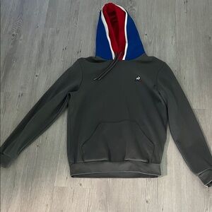 Le Coq Sportif Gray Hoodie with Blue and Red Accents